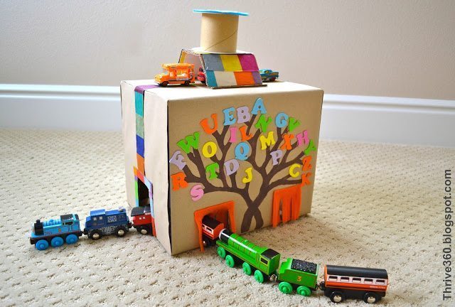 Turn a cardboard box into a fun train and car tunnel toy