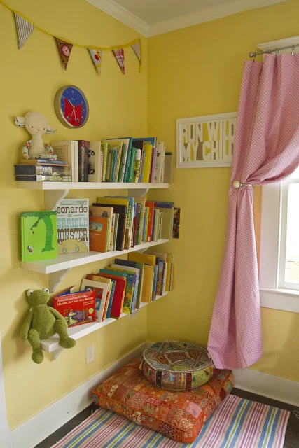 Simple kids reading nook idea - bookshelves with a pillow underneath