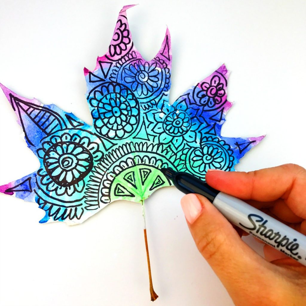 Adding details to our leaf with a sharpie