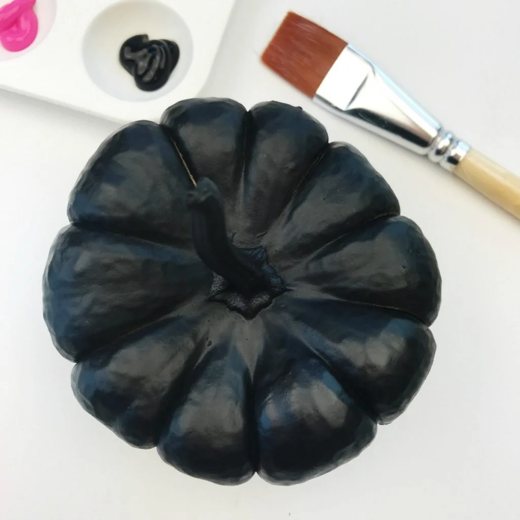 Mini pumpkin painted black
