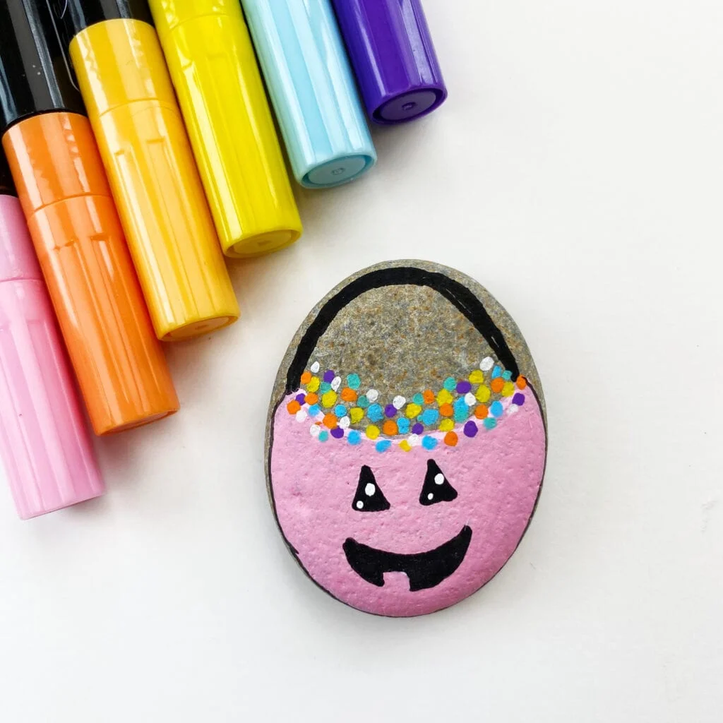 Cute Halloween pumpkin painted rock