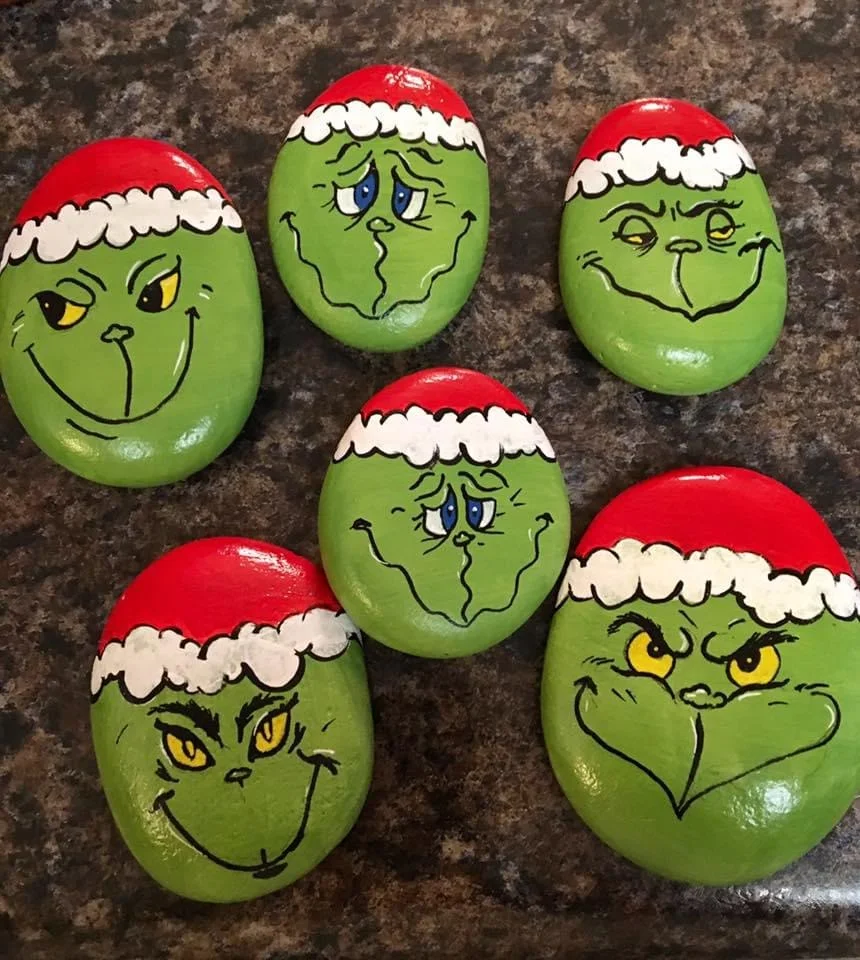 Assorted Rock Painting Ideas to make Christmas hat Grinch Faces