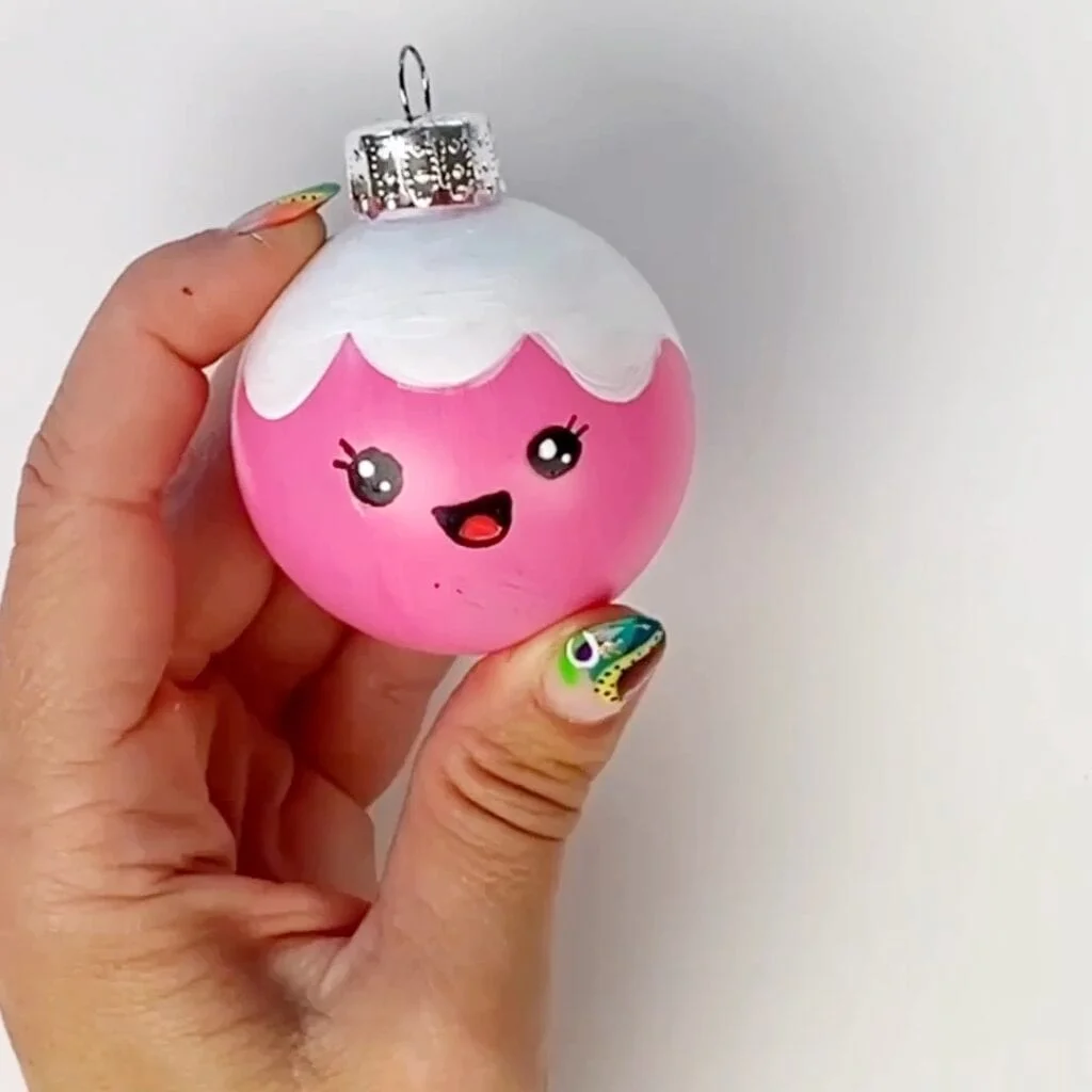Cute face has been added to our painted ice cream cone DIY Christmas ornament