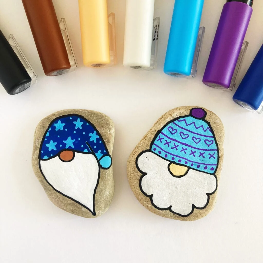 Completed Christmas gnome paintings on rocks
