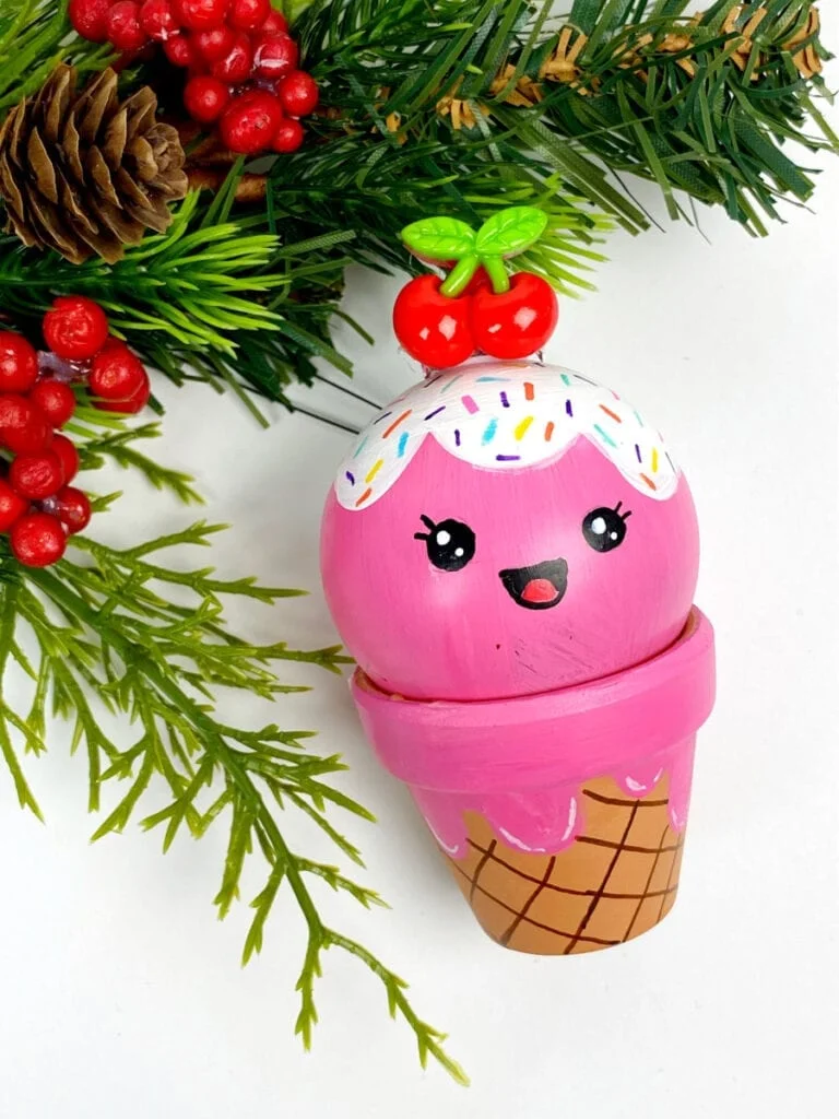 Ice cream ornament hanging on a Christmas tree