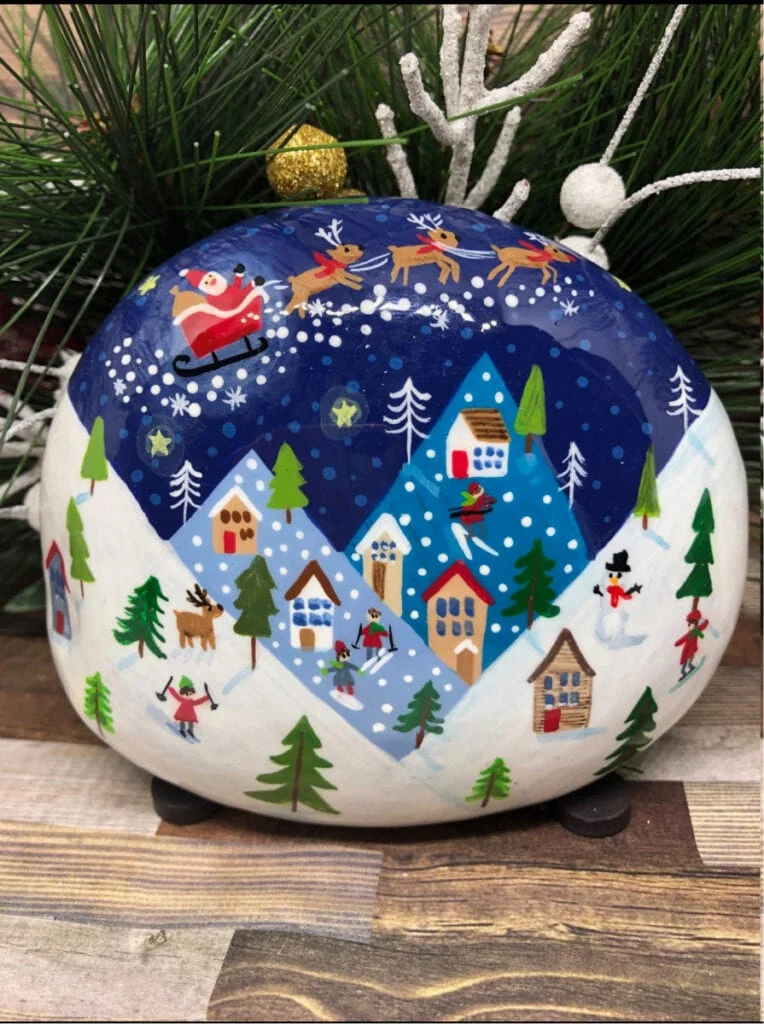 Christmas even scene painting on a rock