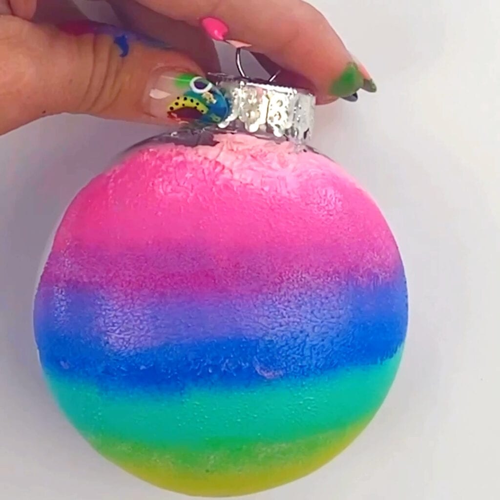 Rainbow painted Christmas tree ornament idea