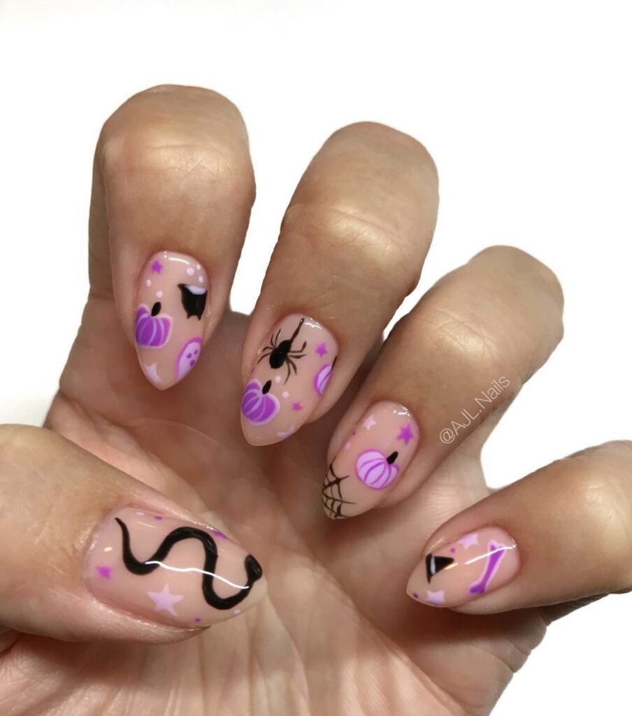Purple and Black Halloween Nail Design on clear nails