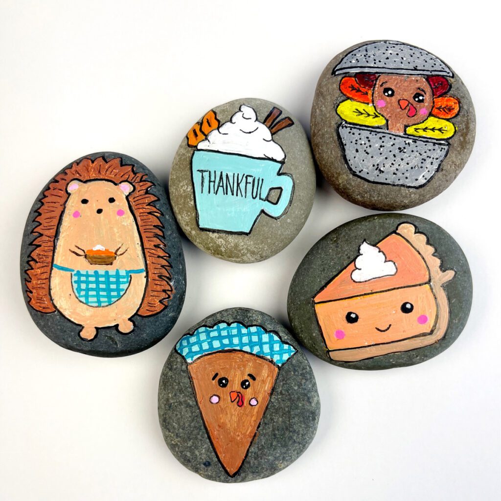 DIY Thanksgiving Painted Rocks - completed photo of several designs