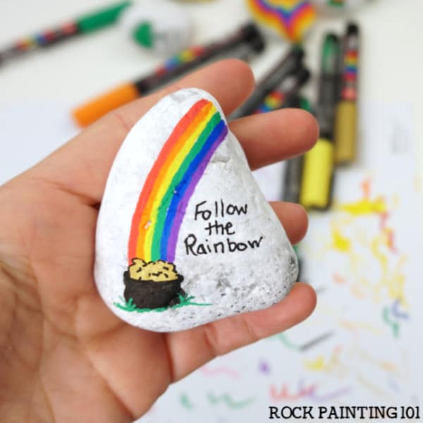 Follow the rainbow painted rock with a pot of gold