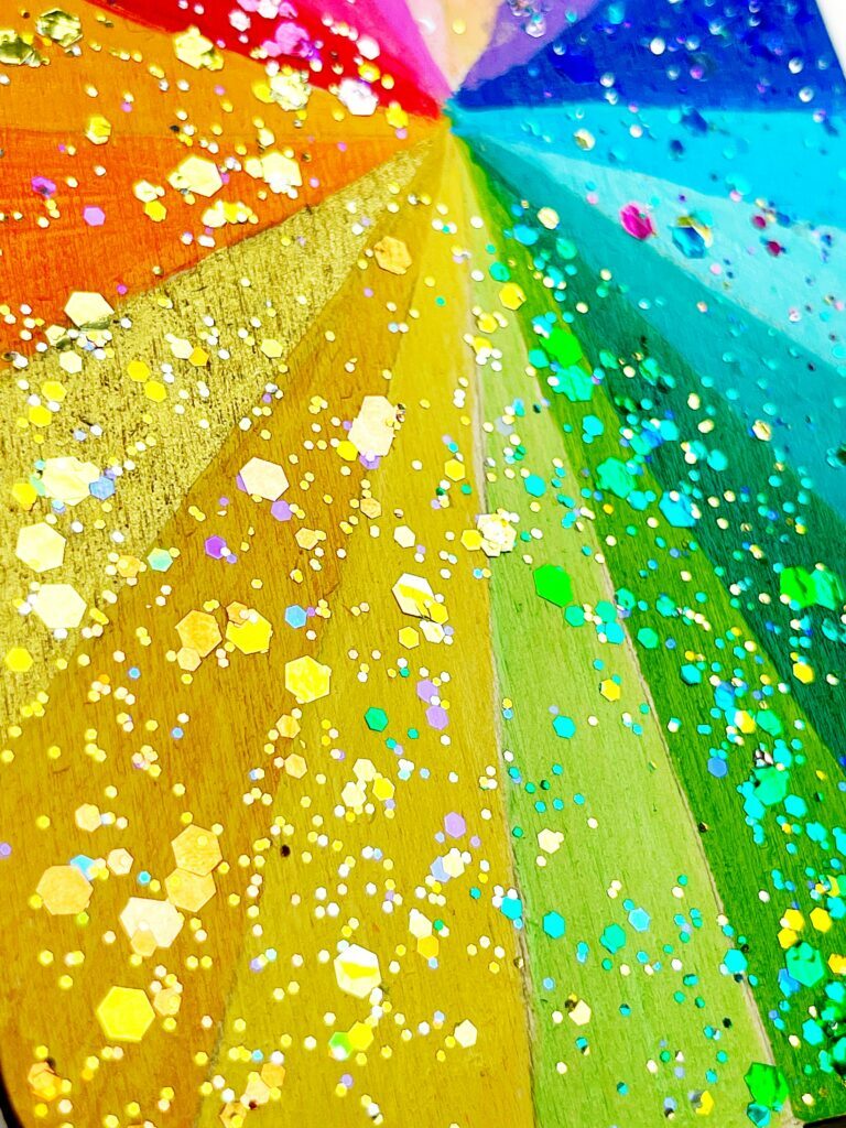 Variety of glitter sizes in glitter paint