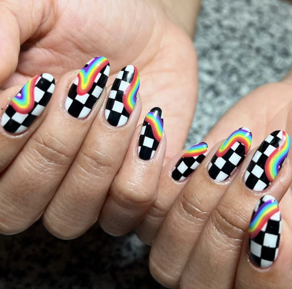 Checkerboard flag and rainbow nail art