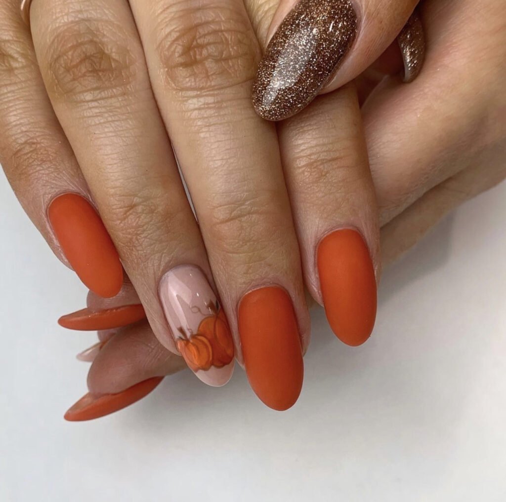 Burnt Orange and Glitter manicure