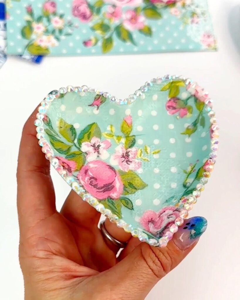 Heart dish decoupaged with a napkin with rhinestones added to the border