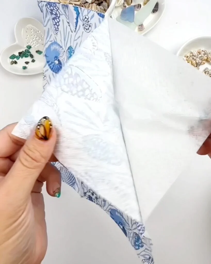 separate napkin to 1-ply before decoupaging