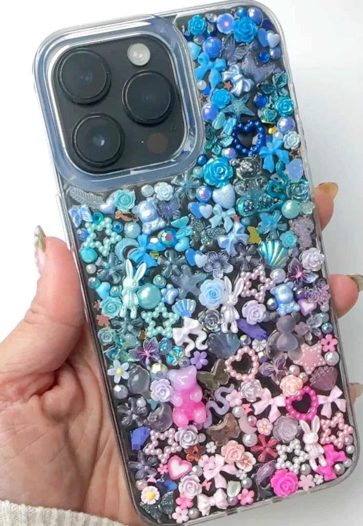 junk phone case covered in charms