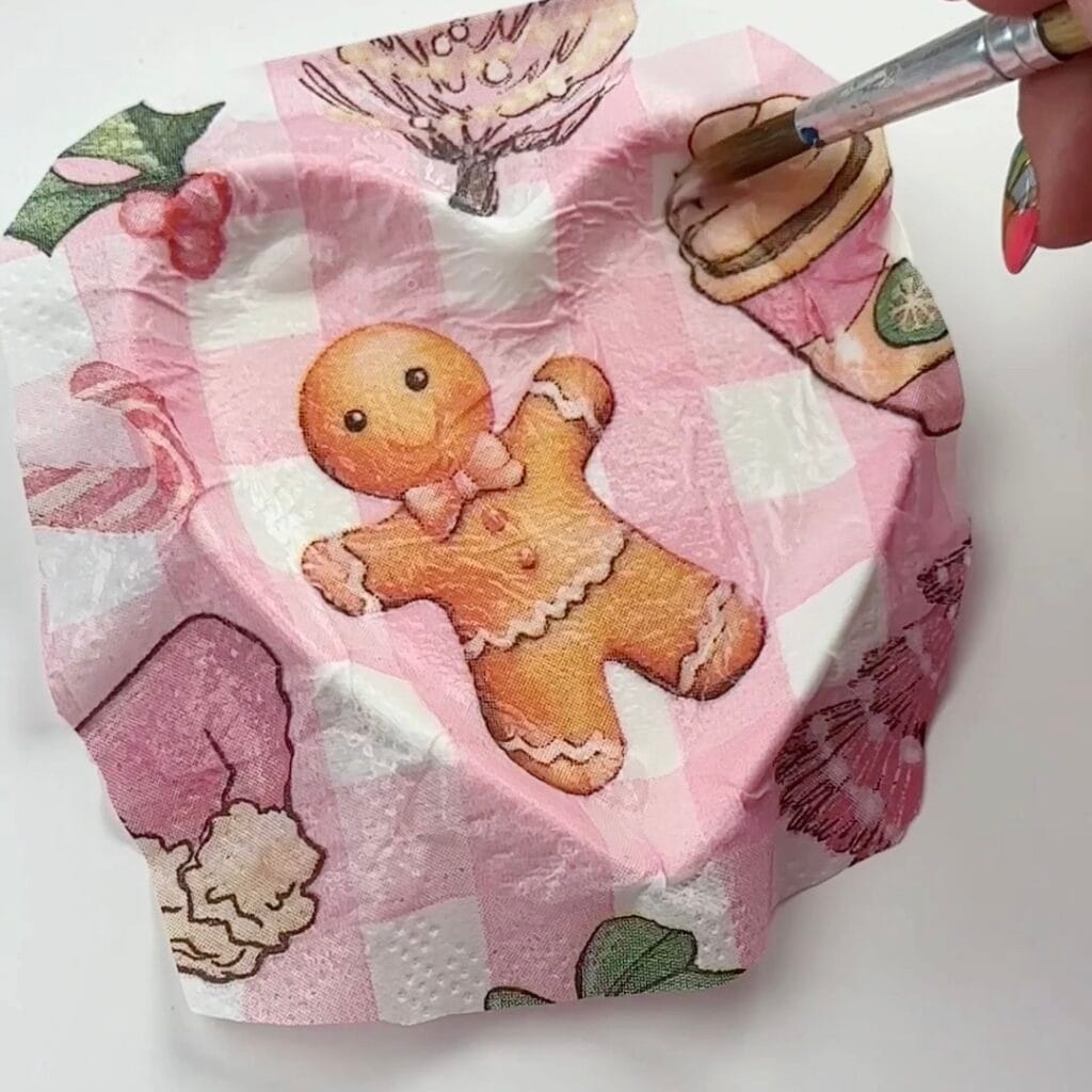 apply Mod Podge on any areas of napkin that need to be smoothed down