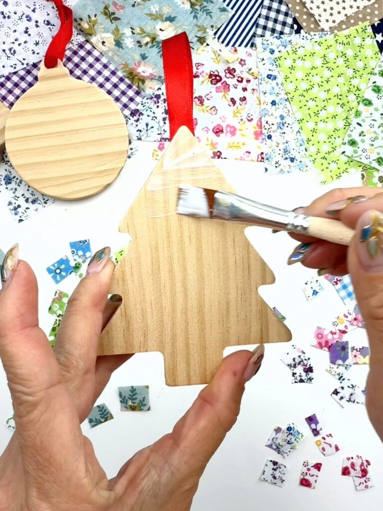 applying Mod Podge before decoupaging 